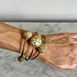 Wrap around gold bracelet with ivory/gold filigree bauble beads